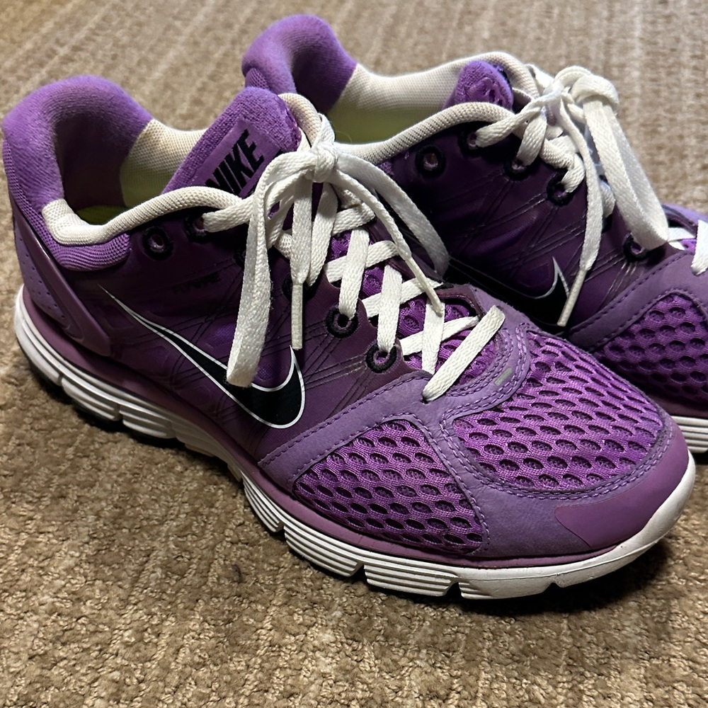 Nike Women’s Purple Athletic Running Shoes with White Accents